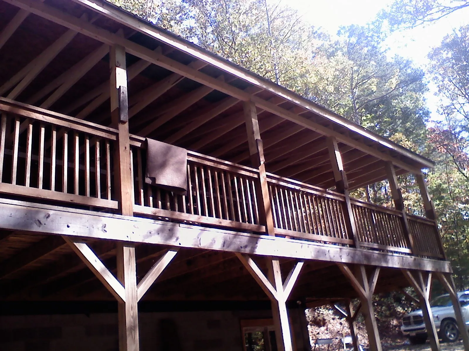 Timber framing under a new elevated porch and deck — Roof Leak Repair in Newtown Square by Roofing Brothers